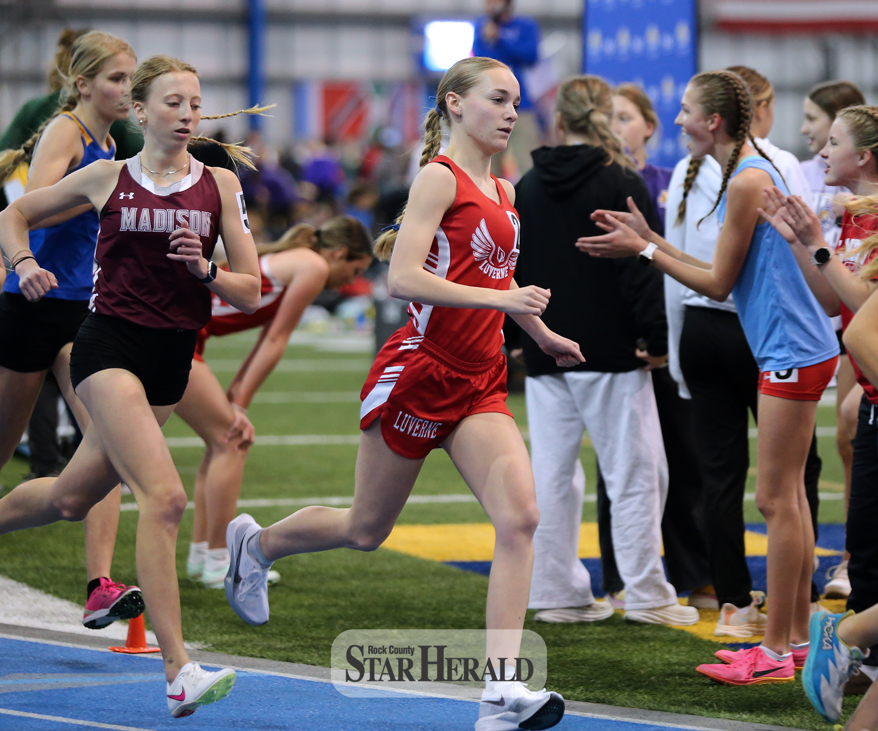Senior Jenna DeBates focuses on her 1600-meter race Saturday, March 23, in Brookings. She finished in third place after pushing her way toward the front at the end of the race.