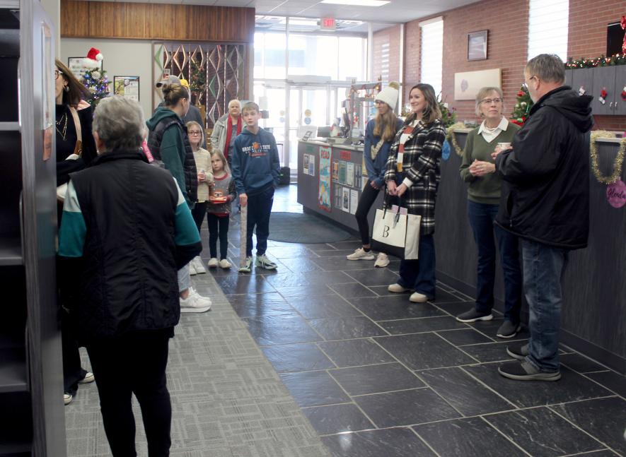 Friends and family gather at the Rock County Community Library Friday afternoon in honor of Barb Verhey (second from right), who officially retired when the library closed at 5 p.m. that day. She worked at the library for 48 years. Mavis Fodness/Rock County Star Herald Photo