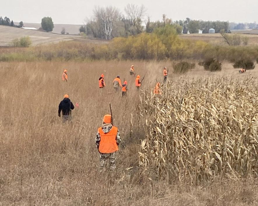 A group of youth hunters and adult mentors hunt and walk on private conservation ground owned by Brad and Rodney Lowe in western Rock County.