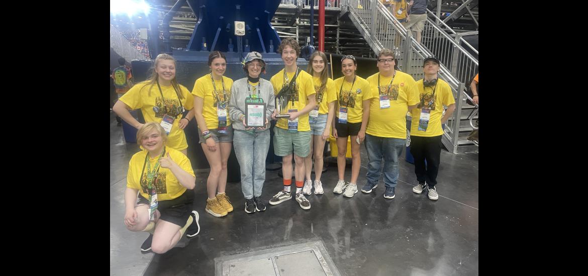 Members of the Luverne High School robotics team pose with their Judges Award. Pictured are (from left) Alex Perkins (kneeling), Brynn Boyenga, Skylar Vander Steen, Zoey Berghorst, Zander Carbonneau, Janica Oechsle, Roselynn Hartshorn, Xavier McKenzie and Owen Stephenson. Submitted Photo