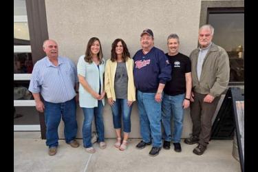 Several former FSA directors attended Stacey Roemen’s retirement party. Pictured are (from left) Ron McCarvel, current director Eva Kramer, retiring technician Stacey Roemen, Roger Carlson, David Schreiber and Fraser Norton. Submitted Photo