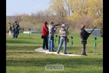 Luverne trap shooters stationed and ready to shoot at the Rock County Sportsman’s Club.