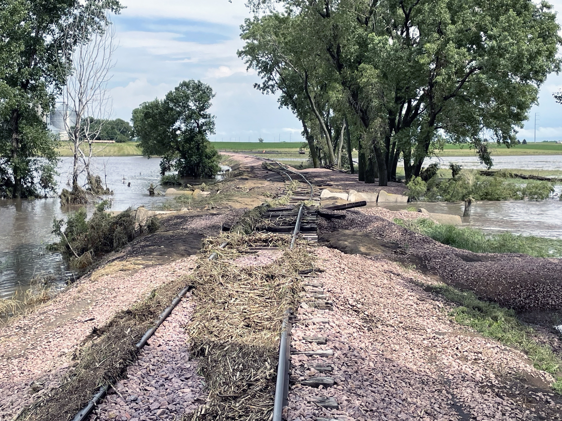 An estimated $900,000 in flood damage occurred along the Buffalo Ridge Regional Railroad (BRRR) in Nobles and Rock counties during the late June weather event. Repair costs (including the section pictured above, west of Magnolia) will be covered by the federal government, as the railroad is owned by the two counties. To speed repairs along, commissioners in Rock and Nobles counties agreed July 2 to split the estimated repair costs and later submit the final cost to FEMA for reimbursement. Submitted Photo