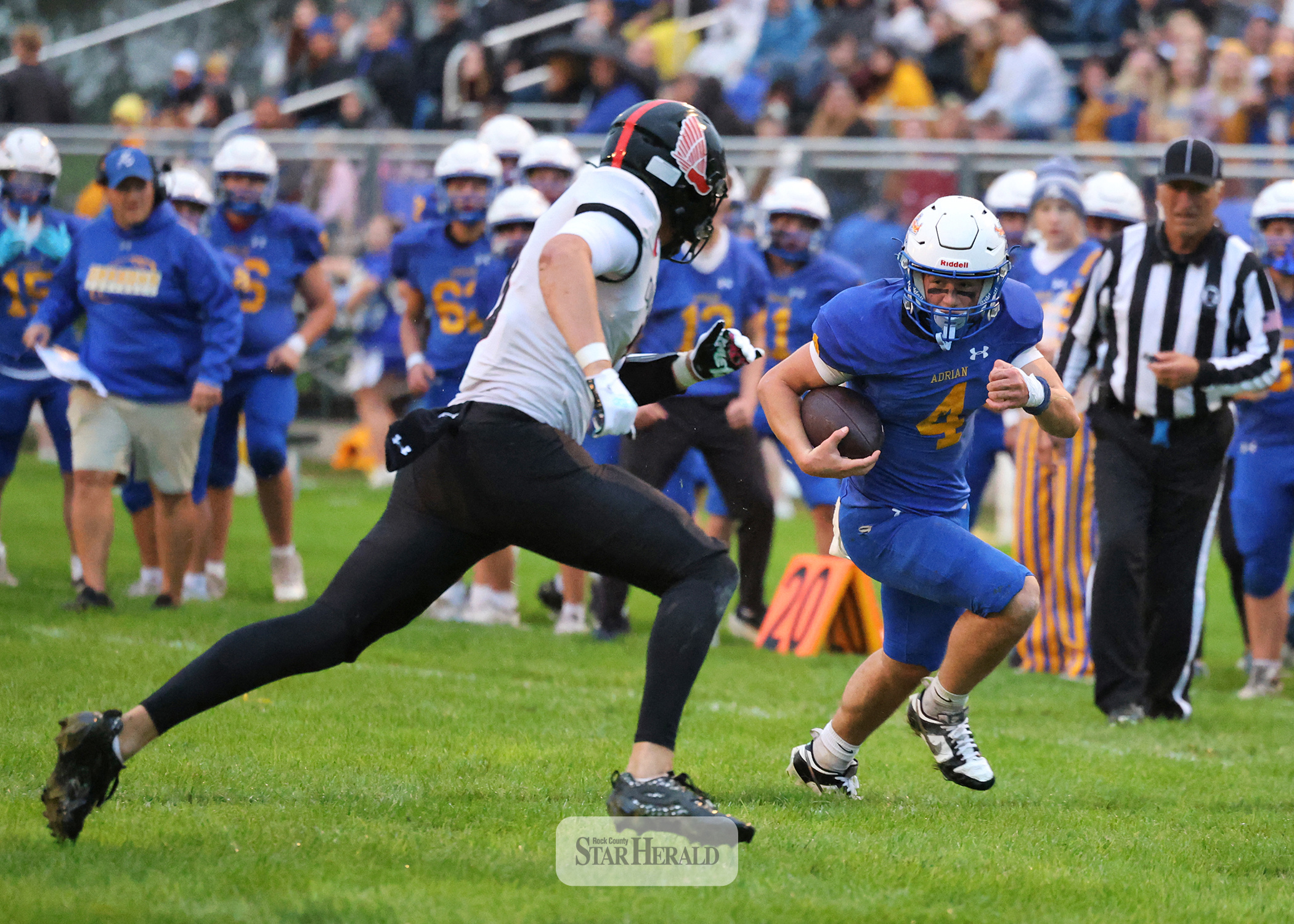 Greg Hoogeveen photo/A-EFB1 Adrian-Ellsworth running back junior Jackson Jenniges finds a lane along the sidelines against Edgerton at home Friday, Sept. 25. The Dragons beat the Flying Dutchmen 22-20 in the homecoming game. Jenniges finished with 105 rushing yards and one TD.