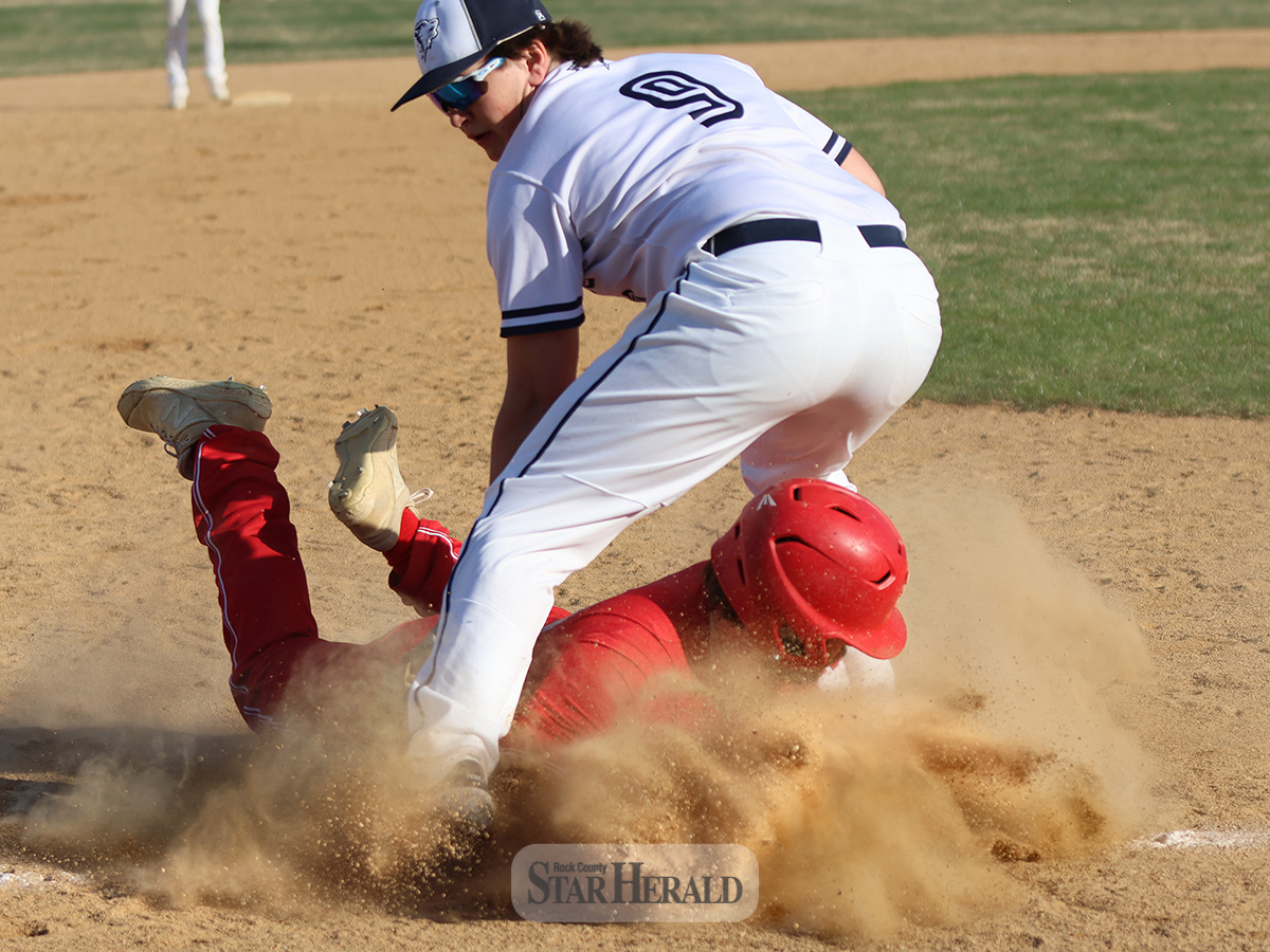 Senior Will Serie safely slides into third base against Jackson at home Tuesday, April 23. Serie had one hit and an RBI in the 10-7 win.