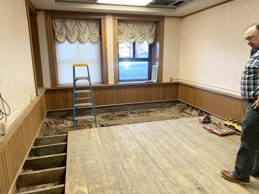 Decades-old water damage was discovered in the first-floor break room of the Rock County Courthouse last week. County Administrator Kyle Oldre shows the extent of the damage, which is also expected in the county administration office. Mavis Fodness/Rock County Star Herald Photo 