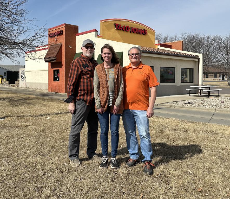 Stan and Tracy Wieneke (left) purchased the Luverne Taco John’s franchise from Ron Christianson (right). The Wienekes also own the downtown Luverne Wildflowers Coffee Boutique, which will be unaffected by their South Highway 75 venture. Lori Sorenson/Rock County Star Herald Photo