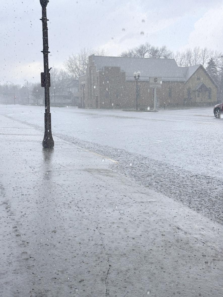 Horizontal heavy rain lasted 5 to 10 minutes Monday afternoon in Luverne, temporarily causing street flooding. Lori Sorenson/Rock County Star Herald Photo