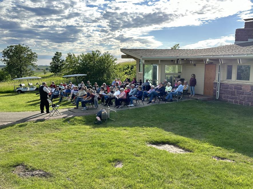 A group of worshippers gather atop the Blue Mounds State Park Saturday evening for a modern-day version of Christ's "Sermon on the Mount." Lori Sorenson/Rock County Star Herald Photo