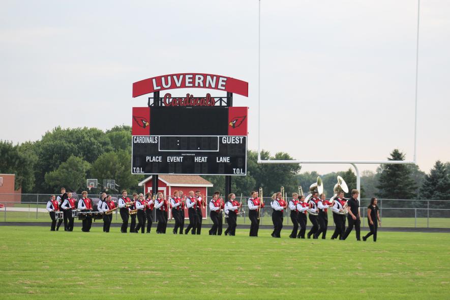 Drum majors Tyler Hodge and Paige Kubesh lead this year’s Luverne High School marching band onto the football field Friday evening for a parent review of their field competition program. Mavis Fodness/Rock County Star Herald Photo