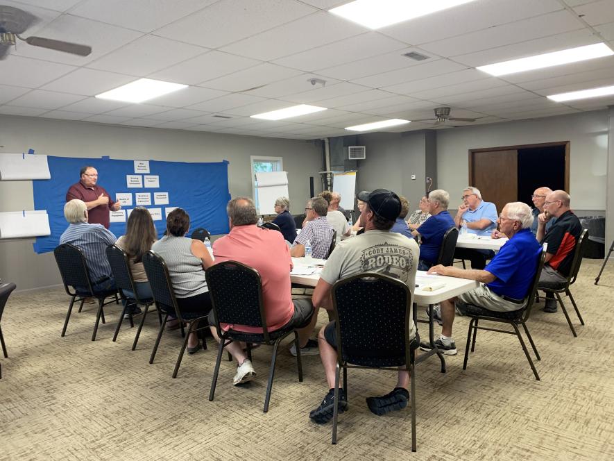 Rock County Administrator Kyle Oldre outlines the county EDA’s community revolving loan to build single family homes within communities in Rock County. The meeting took place Aug. 20 at the Hardwick Community Center and was organized by Revive 2030, an economic development program through Sioux Valley Energy. Mavis Fodness/Rock County Star Herald Photo