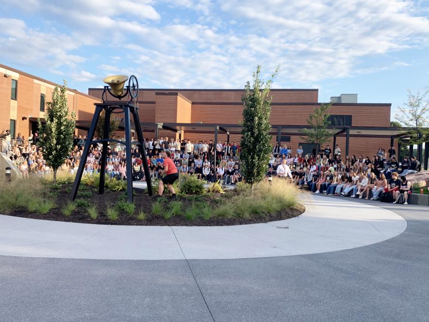 Freshmen through senior students at Luverne High School gathered Tuesday morning in the alumni garden for the ringing of the school bell in recognition of the first day of the 2025-26 school year. Student council president Tyler Hodge rings the newly restored school bell.