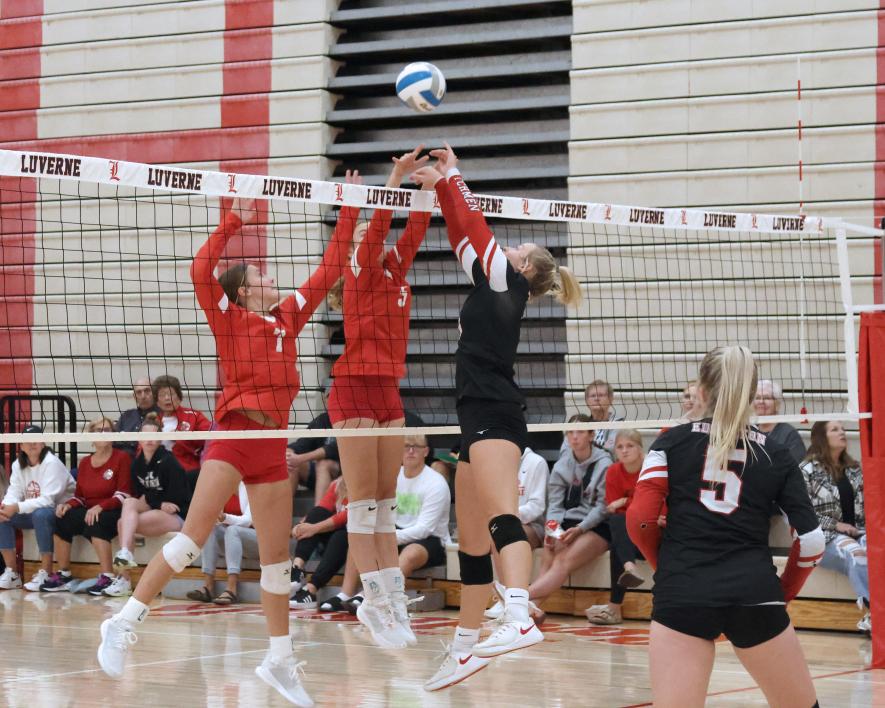 Junior Amira Cowell and senior Tori Serie jump to block a shot from Edgerton Public  Saturday, Sept. 9, at the Luverne volleyball tournament. Luverne beat the Flying Dutchmen in two games.y Star Herald Photo