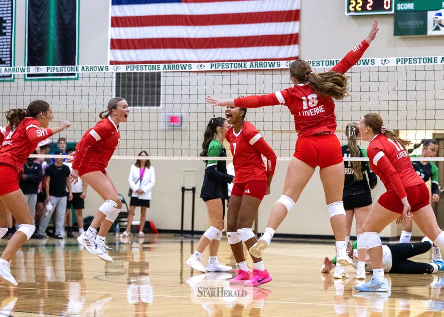Greg Hoogeveen photo/0917LHSVB1 The Luverne Cardinals celebrate their third set win against Pipestone Tuesday, Sept. 10. Pipestone took the first two sets and the Cardinals rallied to capture the next three for the win.