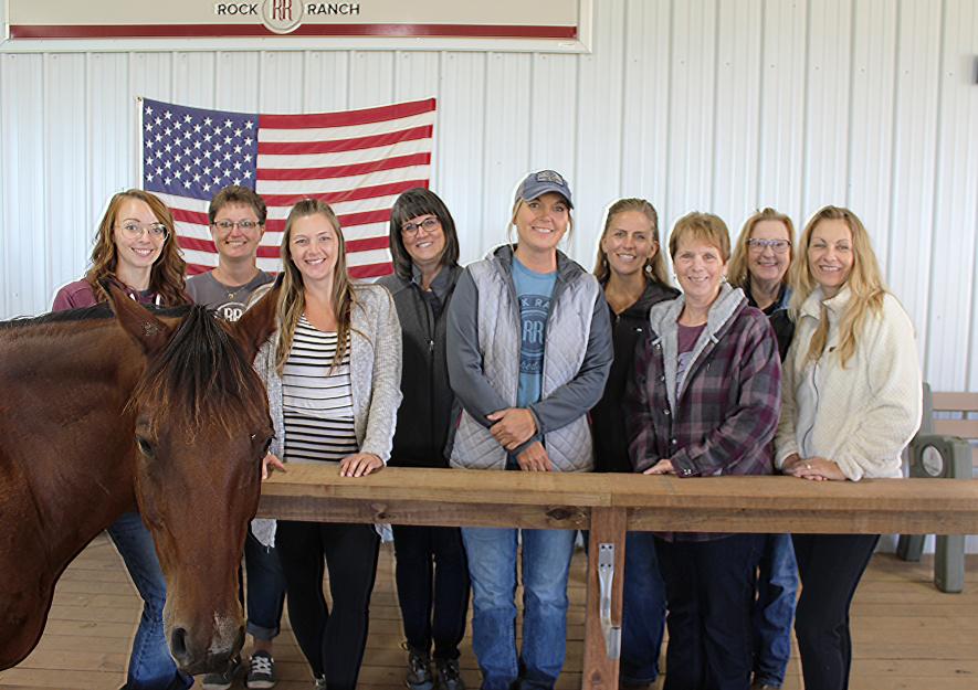Rock Ranch, located west of Hills, recently joined 15 other therapeutic riding facilities in Arenas for Change and formed a local equine-assisted therapy team of (from left) barn manager Jessica Richters, office manager Staci Bundesen, Natasha Kellenberger, Lynne Hunter, Marie LaRock, Carissa Palmberg, Dolores Bundesen, Patti Swenson and Jill Jonnes-Kuca. Mavis Fodness/Rock County Star Herald Photo