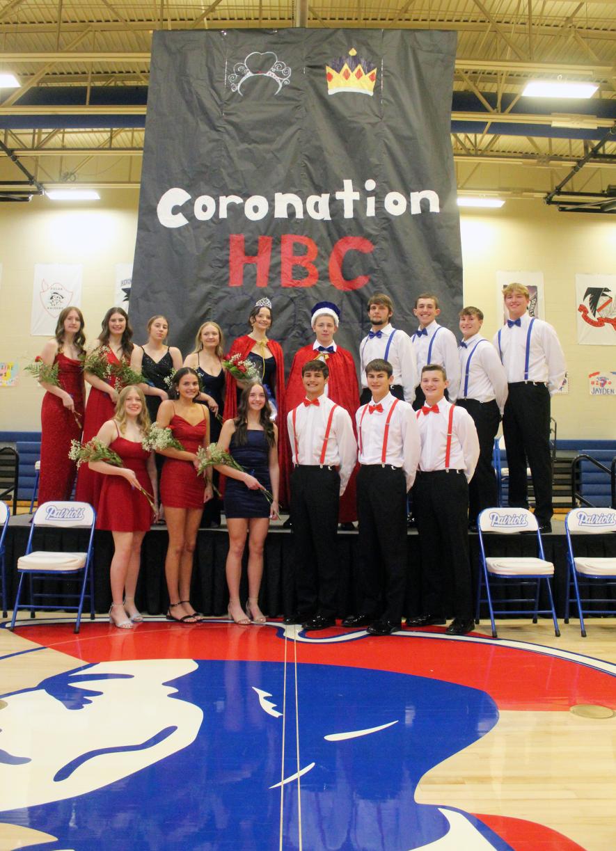 Emma Deelstra and Lukas Hubbard (center with crowns) are the 2024 Hills-Beaver Creek Homecoming queen and king. The two were crowned Monday night during coronation ceremonies in the secondary gymnasium in Hills. Pictured (front from left) are AnnMarie Wiersrma, Olivia Deelstra, Abigail Harris, Micah Bush, Jed Fagerness, Garrett Blank, (back) Bailey Spykerboer, Gracie Fagerness, Gracie Wilhelmi, Harli Rozeboom, queen Emma Deelstra, king Lukas Hubbard, Gate Lacey, Cameron Allen, Talon Steensma and Beau Bakken