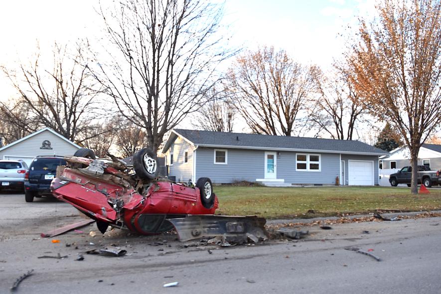 A van crashed into a parked car, rolling it upside down on North Blue Mound Avenue Saturday afternoon Nov. 14.