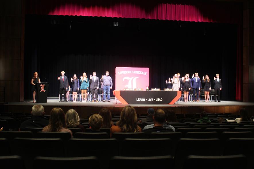 Luverne National Honor Society member Hannah Kempema (far left) administers the society pledge to the 15 new members during the Monday night, Nov. 17, induction ceremony. Mavis Fodness/Rock County Star Herald Photo