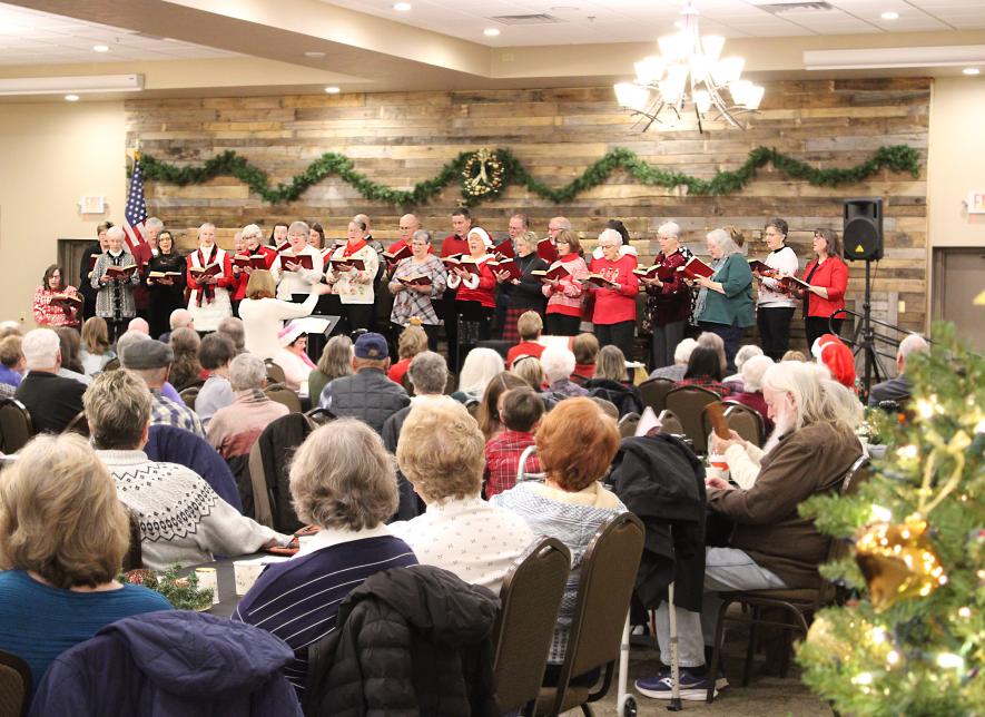 Musical director Barb Antoine leads the Carnegie Minstrels in traditional Christmas carols. The choir is comprised of 25 vocalists with Luverne Street Music. Lori Sorenson/Rock County Star Herald Photo