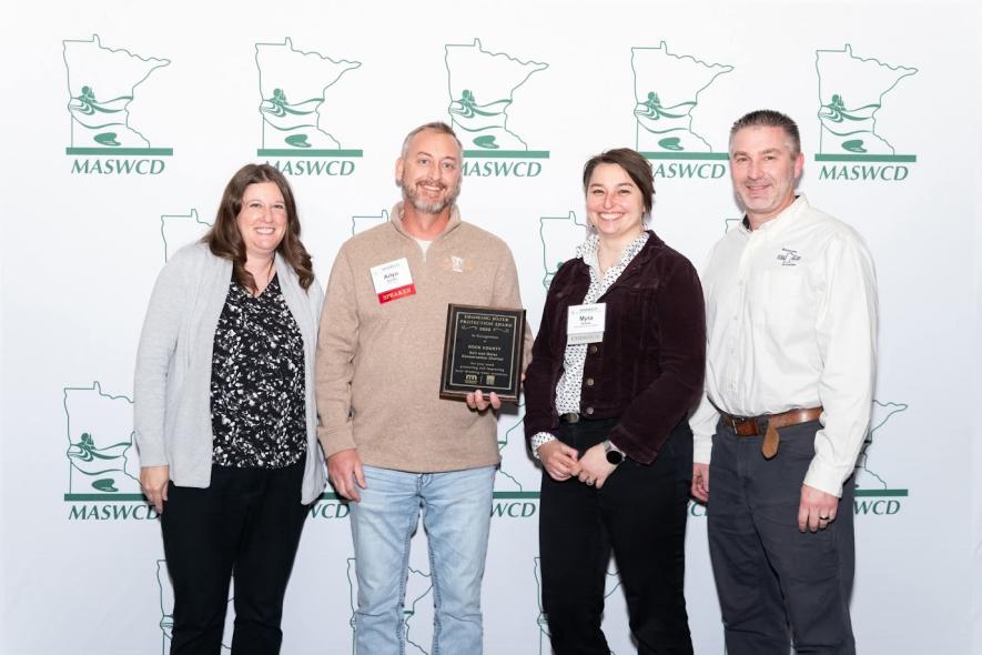 Rock County’s Soil and Water Conservation District received the Minnesota Drinking Water Protection Award during the Minnesota Association of Soil and Water Conservation Districts annual conference in Bloomington on Dec. 1-3. Rock County Land Management Assistant Director Arlyn Gehrke (second from left) accepted the award on behalf of his office. Pictured with him are (from left) Amanda Strommer, principal drinking water protection planner with the Minnesota Department of Health; Myra Kunas, asShared Image 