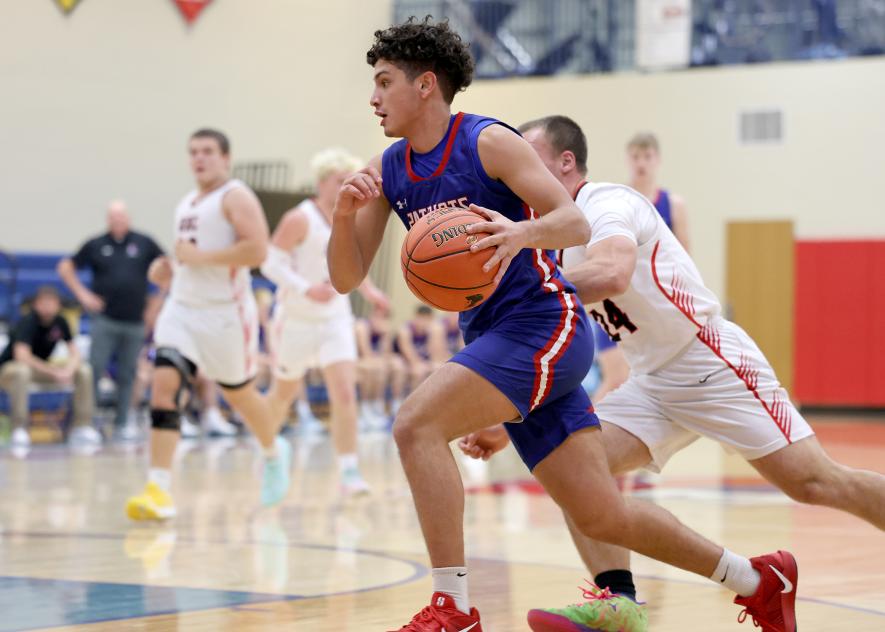 Patriots senior EJ Wegener drives to the bucket in the game against Red Rock Central Thursday, Dec. 11, in Hills. H-BC beat the Falcons 87-52.