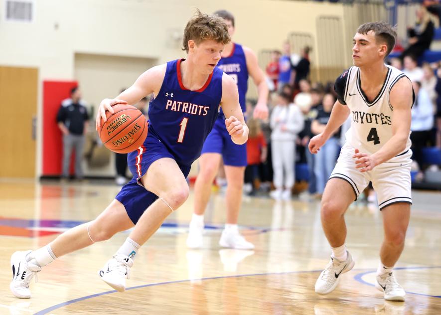 Greg Hoogeveen photo/HBCBBB1 H-BC senior Jacob Wallin drives the lane against Heron Lake Jan. 6 at home. The Patriots beat the Coyotes 76-35 in the game.