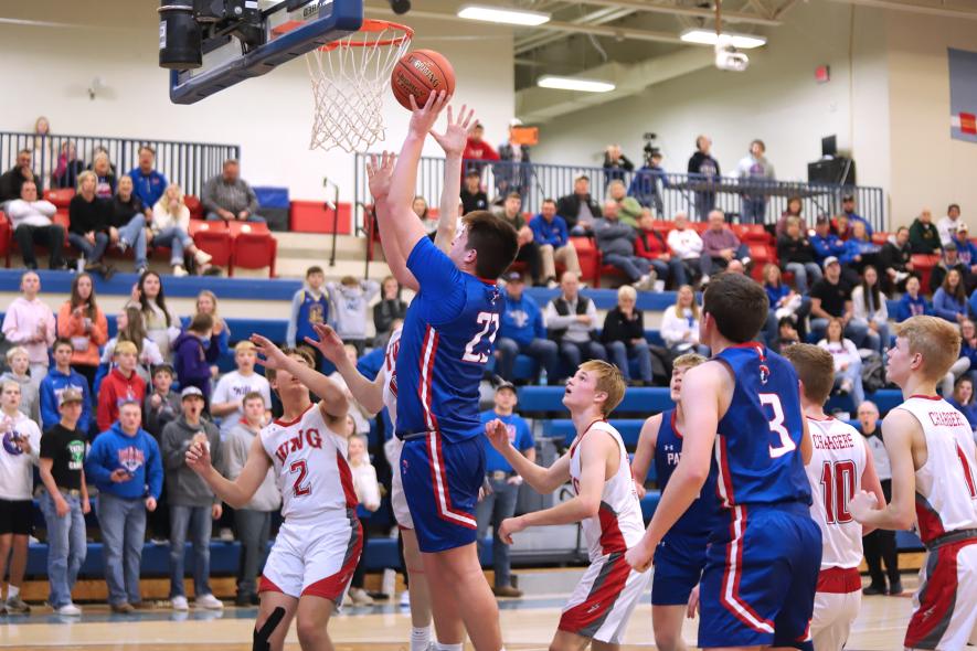 Patriot sophomore Riggins Rheault sends a shot to the hoop against the Chargers Jan. 9 at home. The Patriots beat Westbrook Walnut Grove 55-46 in the game.