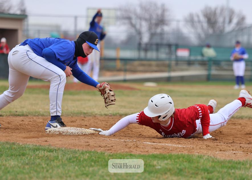 Greg Hoogeveen photo/LHSbaseball1 Luverne junior Maddox Miller safely returns to first base on a pick-off play by Esko Saturday, April 11, in Luverne.