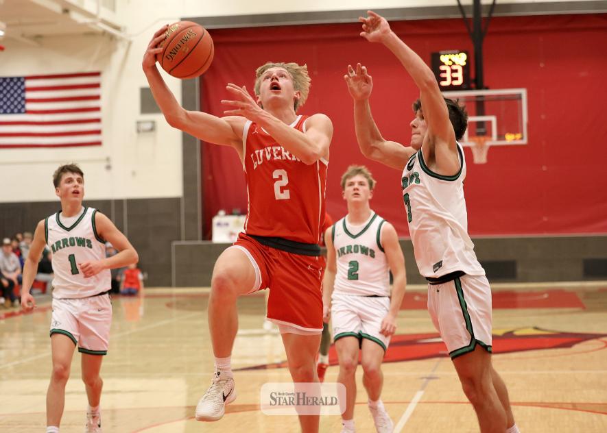 Greg Hoogeveen photo/LHSBBB1 Luverne senior Connor Bose looks to the rim as he heads for a layup against Pipestone Tuesday, Jan. 27, at home. The Cardinals beat the Arrows 67-50 in the conference game.