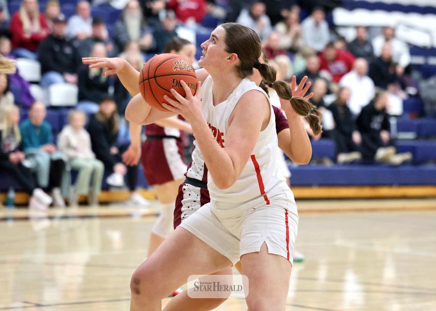 Greg Hoogeveen photo/LHSGBB1 LHS freshman Gracyn Woodley looks for an opening to the basket against Fairmont in girls’ basketball sub-section quarterfinal action in Jackson Feb. 24.