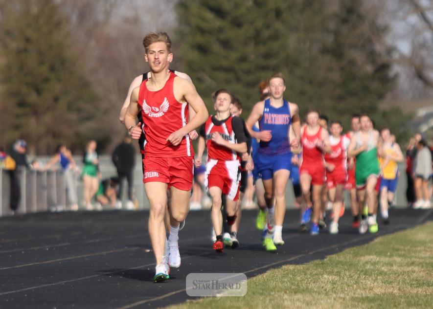Luverne senior Owen Janiszeski leads the pack in the boys’ 1600-meter race Tuesday, April 8, in Luverne. Janiszeski finished in second place, and H-BC freshman Max Sammons, in dark blue, finished in sixth place for the Patriots.