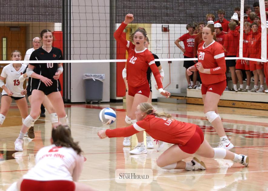 Greg Hoogeveen photo/LHSVB3 Cardinals senior Jocelyn Altman reaches to dig a ball before it hits the court against Redwood Valley Oct. 24 on the Cardinals’ home court. Luverne beat Redwood Valley 3-1 in the Section 3A quarterfinal volleyball match.