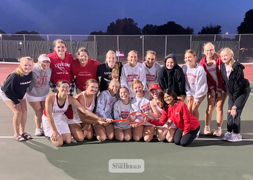 Luverne poses with the Battle Racket after beating Pipestone 4-2 Thursday, Sept. 4, in Luverne. Team members are (front, left) senior Makayla Oechsle, senior Bergan Ask, senior Addyson Mann, senior Jessika Tunnissen, senior Elizabeth Mulder, senior Hannah Kempema, team manager Adelyn Rodriguez, (back) freshman Cindy Rogers, sophomore Macrena Reverts, freshman Gracyn Woodley, freshman Naima French, freshman Lilly Lanoue, junior Sophia Remme, junior Allyssa Evers, sophomore Lauren Peters, junior Olivia Ver St