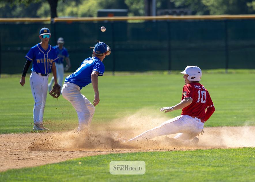 Blake Sauer safely slides into second base against Windom July 11 at home in sub-sub state game action. Windom beat Luverne 6-4 with both teams advancing to sub-state tourney.
