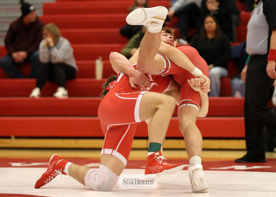 Greg Hoogeveen photo/WRES1 LHS junior Matthew Gangestad takes his Redwood Valley opponent to the mat in Luverne Dec. 4. Gangested lost his 172-pound weight class match as Luverne fell 47-18 in the dual.