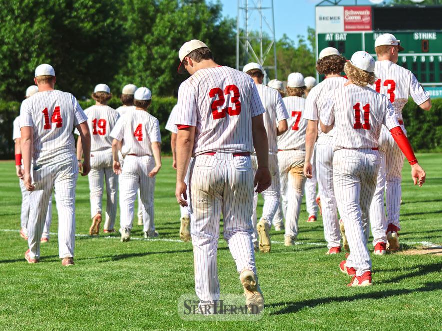 The Luverne baseball team heads to the outfield after being eliminated from the section tournament.
