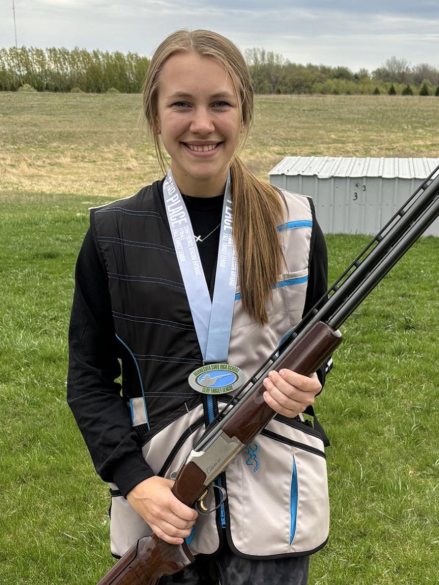 LHS junior Piper Wynia received her medal this past week for placing second in the female division of trap shooting Minnesota Class 1A, Conference 9, for the fall of 2023.