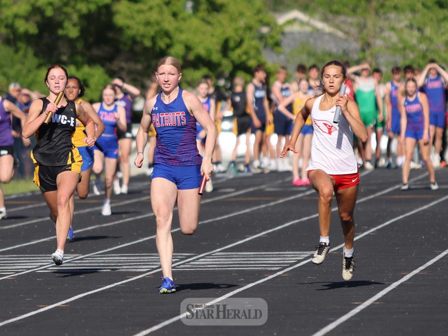H-BC freshman Brynn Bakken, center in blue, and LHS senior Sarah Stegenga, center in red, anchor the girls’ 4-by-400-meter relay. The Patriots took the race in a time of 51.45, and Luverne was second with a time of 52.16. Both teams competed in the Section 3A South Sub Sections Thursday, May 23.