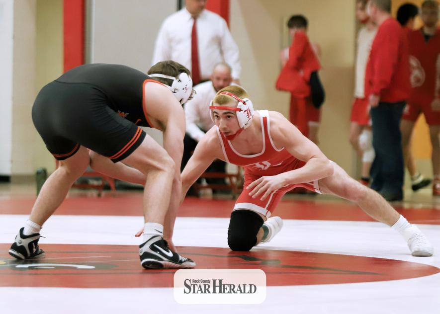 Senior Leif Ingebretsen sizes up his Marshall opponent and looks for a take-down shot on the mat Thursday, Jan. 30, in Luverne. The Cardinals fell 62-12 in the dual.