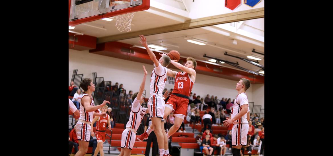 Jaydon Johnson takes to the air against a St. James opponent for a basket Thursday, Feb. 8, in Luverne. The Cardinals won the game 80-45 over the Saints.