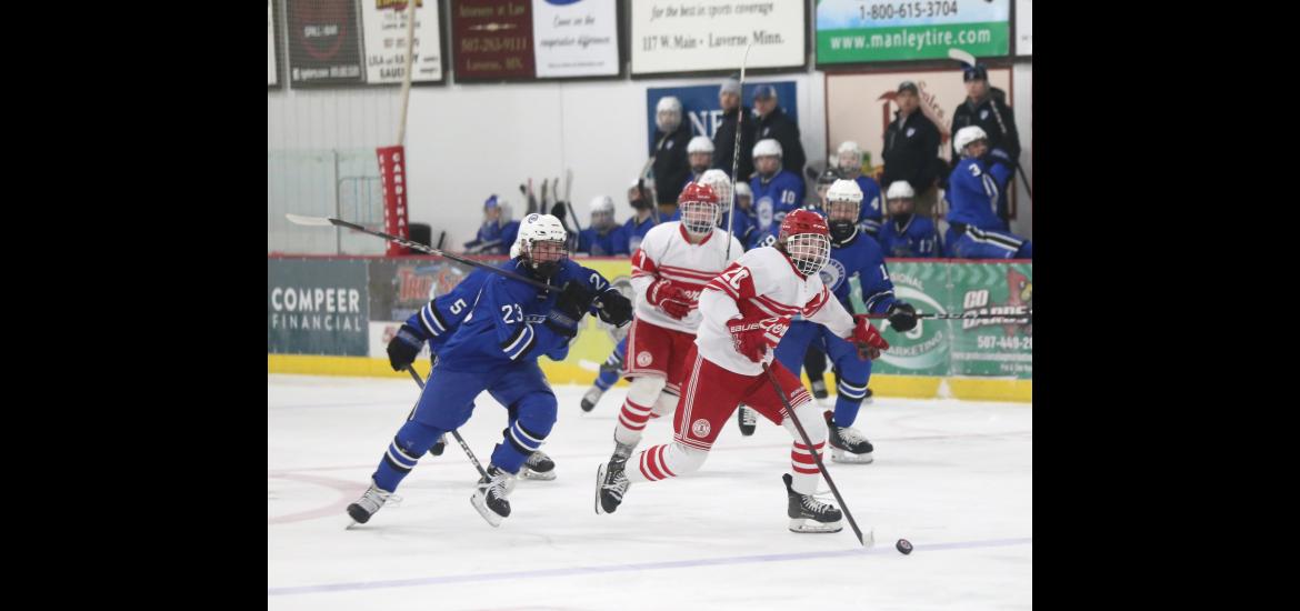 Junior Marcus Vortherms leads a Luverne break away toward the Bulldogs goal followed by junior Alex Schlosser Saturday, Feb. 10, as he scores a goal in the LHS 5-2 win on home ice.