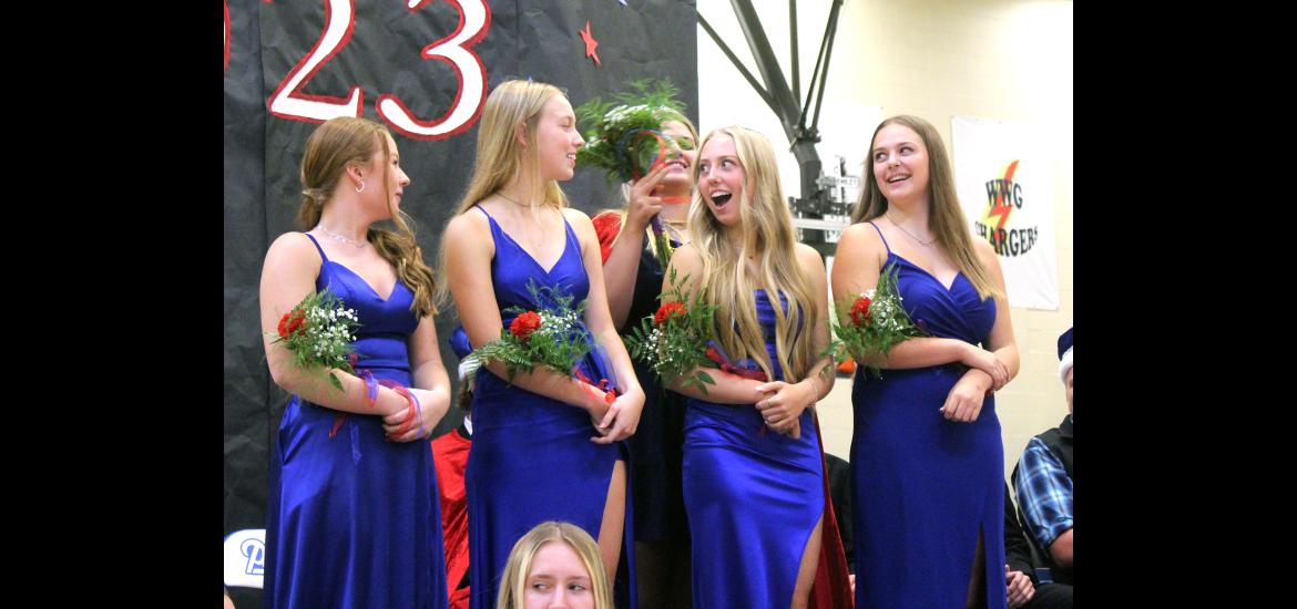 Grace Anderson (third from left) reacts as last year’s homecoming queen, Taylor Huisman, places a crown on her head. Pictured (from left) are Sylvia Fick, Avril Susie, Anderson and Taylor Gehrke. Mavis Fodness/Rock County Star Herald Photo