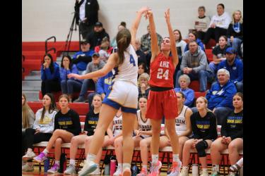 LHS freshman Khloe Visker puts up a 3-point shot against Windom Tuesday, Jan. 2, in Luverne. Luverne fell 68-56 to the Eagles in the game.