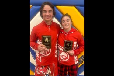 LHS wrestlers senior Sam Rock and his sister sophomore Bernie Rock received “Most Outstanding Wrestler” honors at the Jesse James Invitational Saturday, Jan. 6