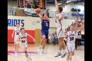 Micah Bush, H-BC sophomore, goes airborne for a layup against Mountain Lake Thursday, Jan. 18. The Patriots fell in a 62-54 game at home.