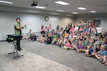 Magician Dr. Street helped the Rock County Library kick off the summer reading program June 4 in the library basement. More than 80 children and adults attended the event, which is one of more than 40 planned to occur this summer by library staff. Mavis Fodness/Rock County Star Herald Photo
