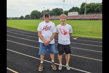 Al Stoakes and coach Pete Janiszeski recently received statewide honors. Stoakes was named Minnesota Class A Track and Field Volunteer of the Year. Janiszeski is the Minnesota Class A Girls Track and Field Head Coach of the Year. Jason Berghorst/Rock County Star Herald Photo