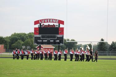 Drum majors Tyler Hodge and Paige Kubesh lead this year’s Luverne High School marching band onto the football field Friday evening for a parent review of their field competition program. Mavis Fodness/Rock County Star Herald Photo