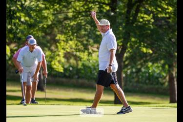 Greg Hoogeveen photos/LCCtourney Pete Connell raises his arm after his final put in the men’s club tournament Aug. 15. Connell won the championship with a with a 36-hole score of 148 in the two-day event.