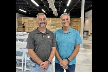 Arlyn Gehrke (left) officially takes over this week for Doug Bos who is retiring from 29 years with the Rock County Land Management Office and Rock County Soil and Water Conservation District. They’re pictured at Bos’s retirement party Thursday afternoon at Big Top Tents and Events. Lori Sorenson/Rock County Star Herald Photo